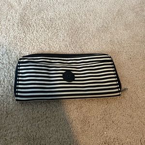 Brand new Kipling travel pouch